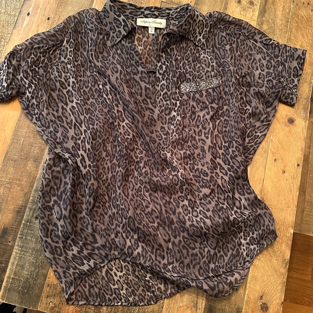 Gorgeous animal print blouse with sequin detail. EUC